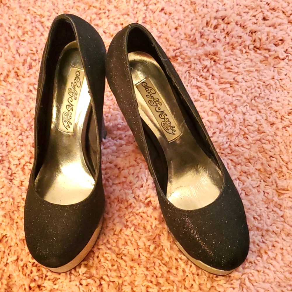 Black and silver platform heels